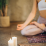 Woman sitting in meditation pose outdoors